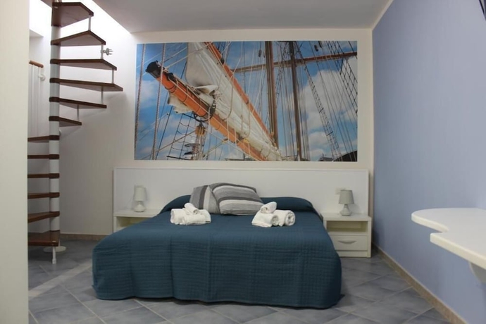 Imagen de la habitación del Hotel 103 Boutique Stintino. Foto 13