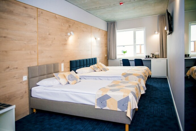 Imagen de la habitación del Hotel 107. Foto 20