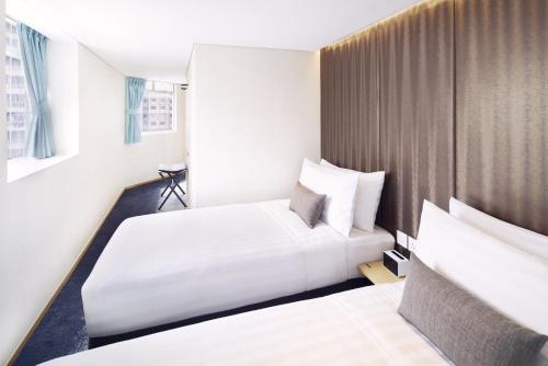 Imagen de la habitación del Hotel 108, Kowloon. Foto 9