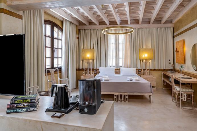 Imagen de la habitación del Hotel 10GR Boutique and Wine Bar. Foto 2