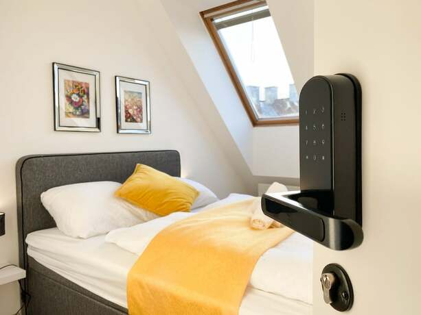 Imagen de la habitación del Hotel 10-Min Walk to Hauptbahnhof, Cozy Private Rooms with AC, TV & WIFI. Foto 11