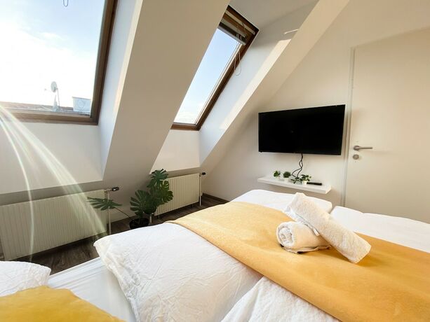 Imagen de la habitación del Hotel 10-Min Walk to Hauptbahnhof, Cozy Private Rooms with AC, TV & WIFI. Foto 12