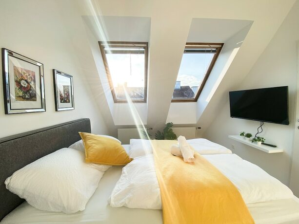 Imagen de la habitación del Hotel 10-Min Walk to Hauptbahnhof, Cozy Private Rooms with AC, TV & WIFI. Foto 15