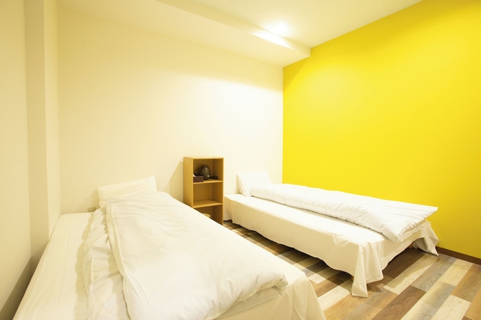 Imagen de la habitación del Hotel 123 Guesthouse. Foto 3