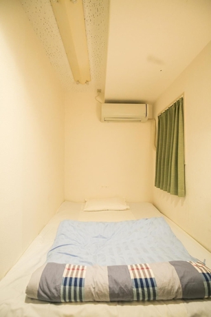 Imagen de la habitación del Hotel 123 Guesthouse. Foto 4