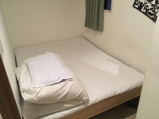 Imagen de la habitación del Hotel 123 Guesthouse. Foto 5