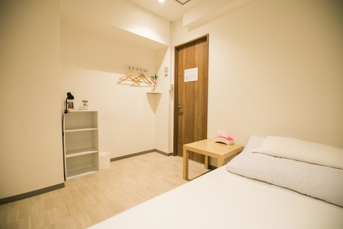 Imagen de la habitación del Hotel 123 Guesthouse. Foto 10