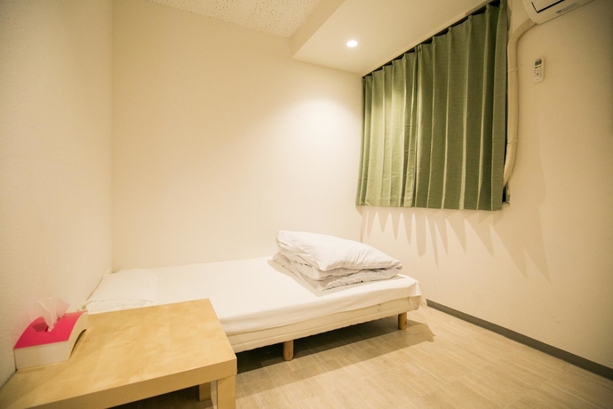 Imagen de la habitación del Hotel 123 Guesthouse. Foto 11