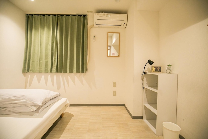 Imagen de la habitación del Hotel 123 Guesthouse. Foto 13