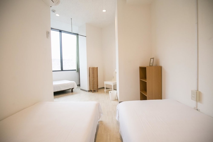 Imagen de la habitación del Hotel 123 Guesthouse. Foto 14
