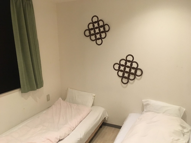 Imagen de la habitación del Hotel 123 Guesthouse. Foto 15