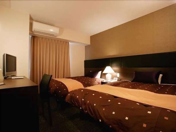 Imagen de la habitación del Hotel 1-2-3 Takasaki. Foto 4
