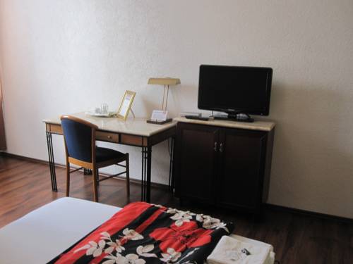 Imagen de la habitación del Hotel -12-apostel. Foto 8