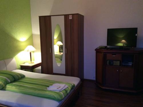 Imagen de la habitación del Hotel -12-apostel. Foto 13