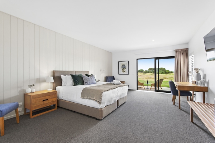 Imagen de la habitación del Hotel 13th Beach Golf Lodges. Foto 9