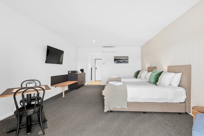 Imagen de la habitación del Hotel 13th Beach Golf Lodges. Foto 10