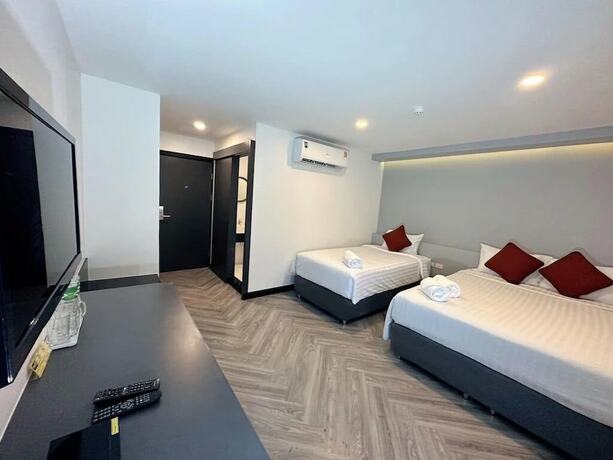 Imagen de la habitación del Hotel 14 Sathorn. Foto 17