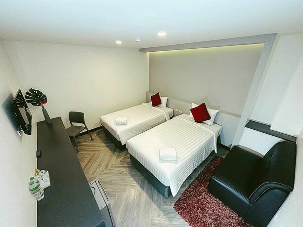 Imagen de la habitación del Hotel 14 Sathorn. Foto 18