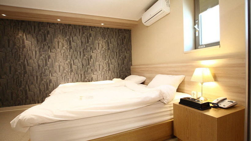 Imagen de la habitación del Hotel 141 Mini. Foto 2