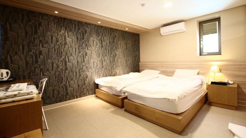 Imagen de la habitación del Hotel 141 Mini. Foto 7