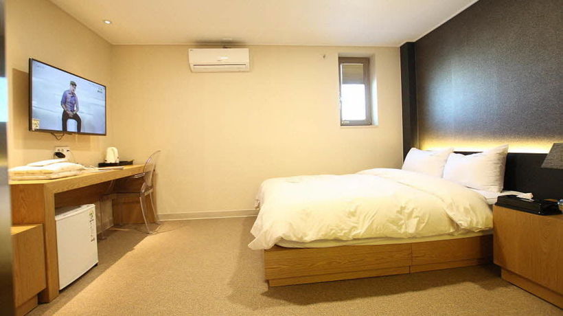 Imagen de la habitación del Hotel 141 Mini. Foto 8