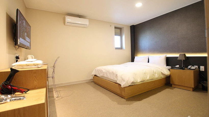 Imagen de la habitación del Hotel 141 Mini. Foto 11