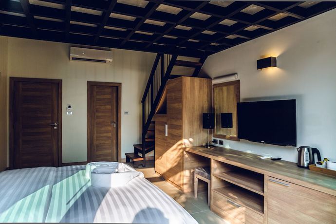 Imagen de la habitación del Hotel 15 Palms Beach Resort. Foto 9
