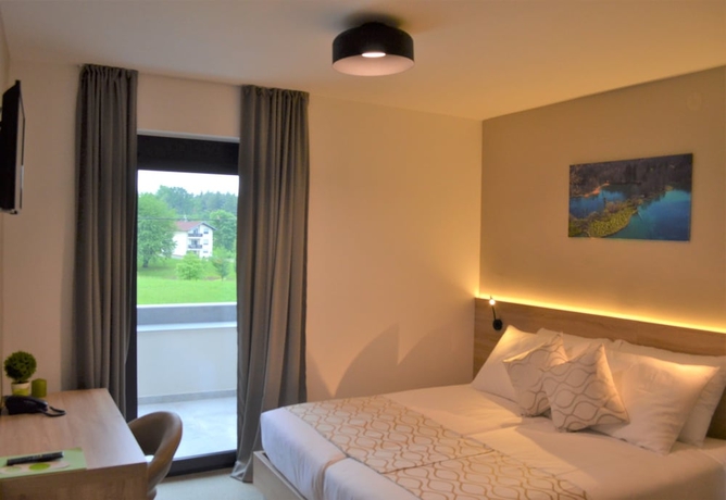 Imagen de la habitación del Hotel 16 Lakes. Foto 12