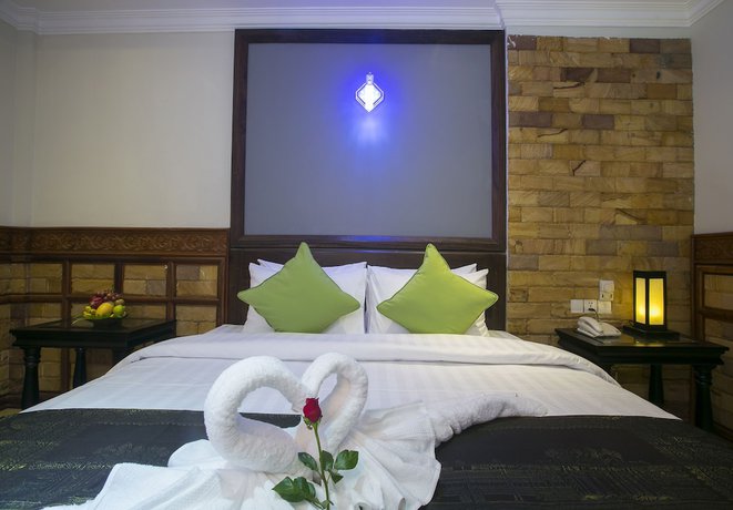 Imagen de la habitación del Hotel 160 Angkor Villa. Foto 6