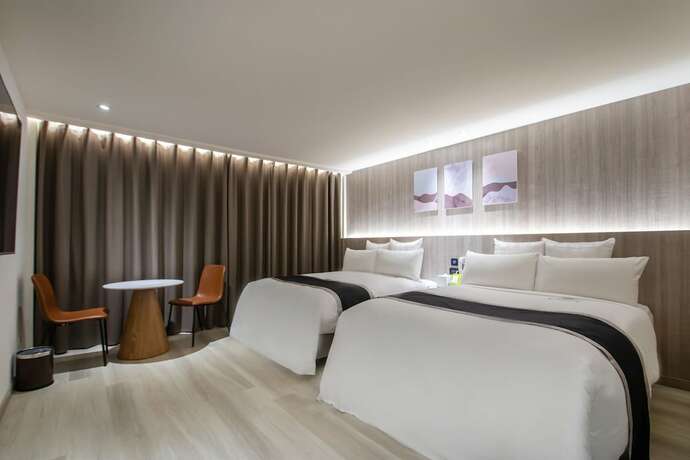 Imagen de la habitación del Hotel 168 Motel-macaron. Foto 34
