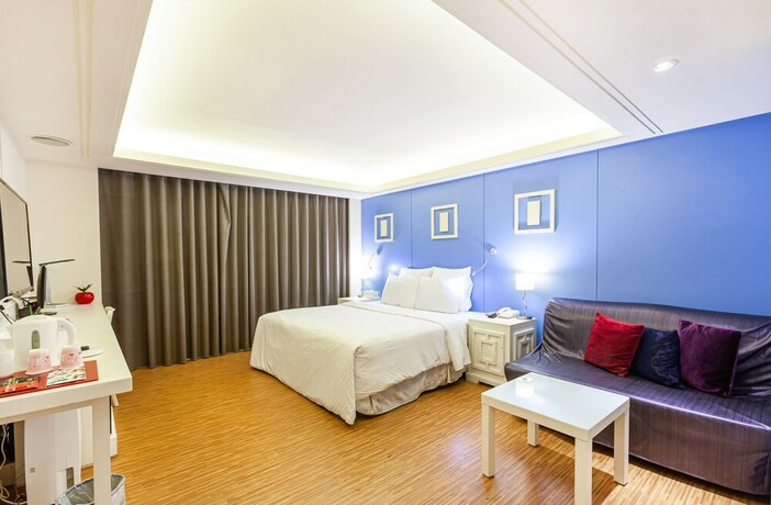 Imagen de la habitación del Hotel 168 Motel-macaron. Foto 37