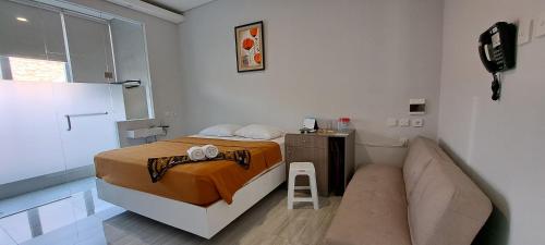 Imagen de la habitación del Hotel 168 Salatiga. Foto 17
