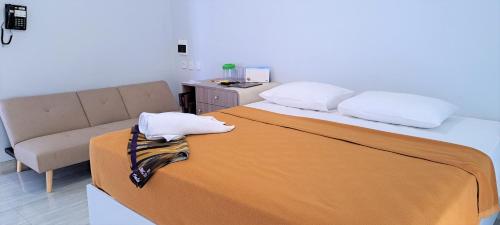 Imagen de la habitación del Hotel 168 Salatiga. Foto 18
