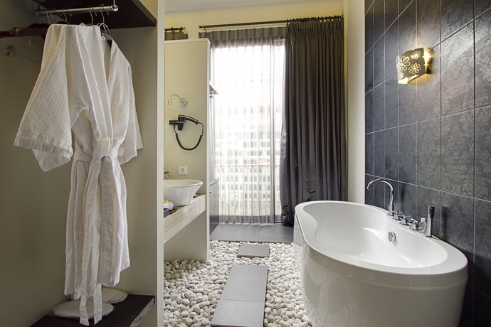 Imagen de la habitación del Hotel 18 Suite Villa Kuta. Foto 4