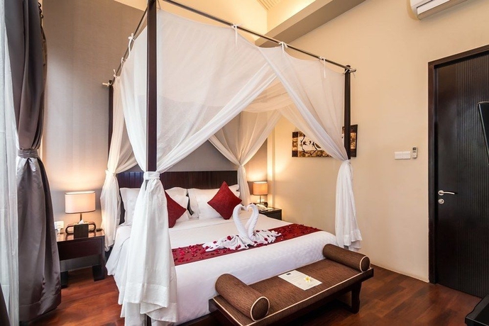 Imagen de la habitación del Hotel 18 Suite Villa Kuta. Foto 7