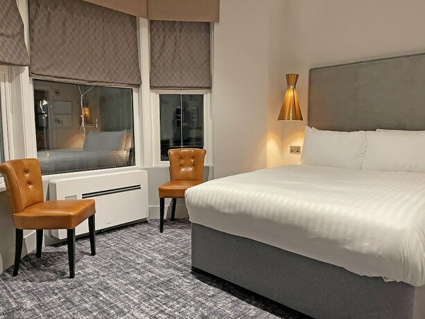 Imagen de la habitación del Hotel 1820 Boutique Rooms and Suites. Foto 17