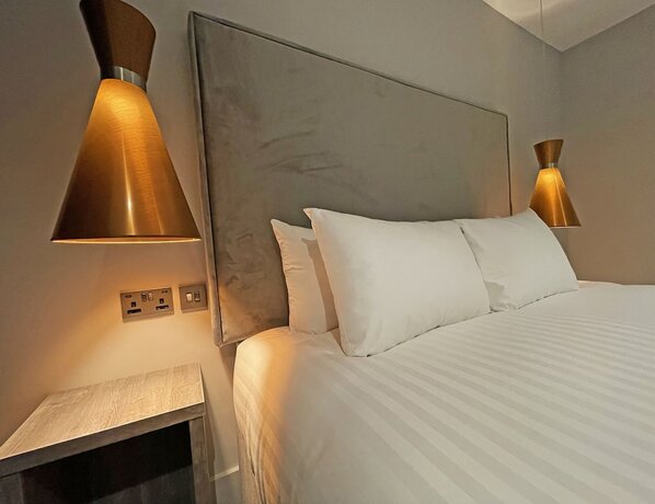 Imagen de la habitación del Hotel 1820 Boutique Rooms and Suites. Foto 18