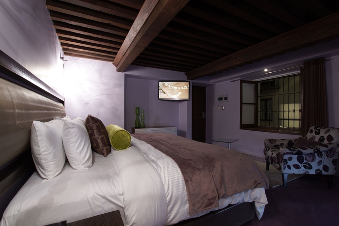 Imagen de la habitación del Hotel 1850 Boutique. Foto 6