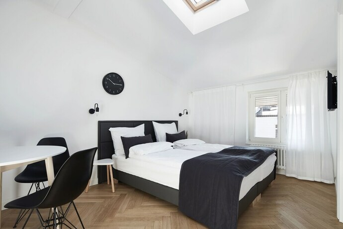 Imagen de la habitación del Hotel 1891 Aparthotel Attic. Foto 13