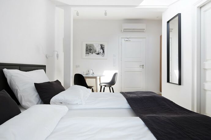 Imagen de la habitación del Hotel 1891 Aparthotel Attic. Foto 14