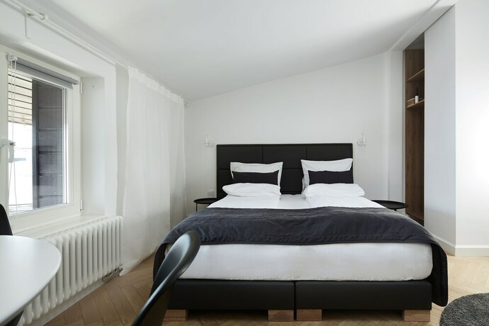 Imagen de la habitación del Hotel 1891 Aparthotel Attic. Foto 16