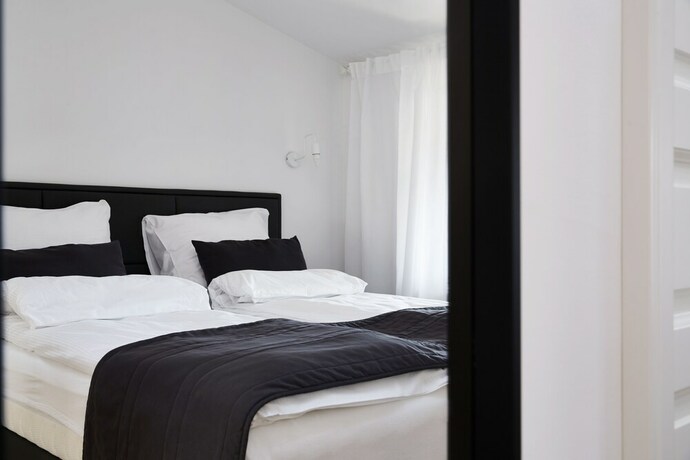 Imagen de la habitación del Hotel 1891 Aparthotel Attic. Foto 19