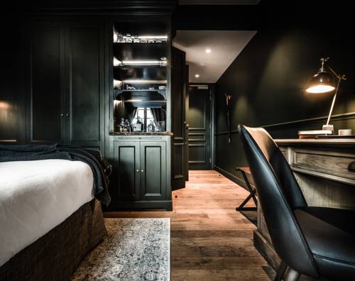 Imagen de la habitación del Hotel 1898 The Post. Foto 10