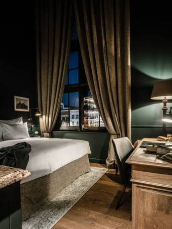 Imagen de la habitación del Hotel 1898 The Post. Foto 15