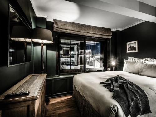 Imagen de la habitación del Hotel 1898 The Post. Foto 5