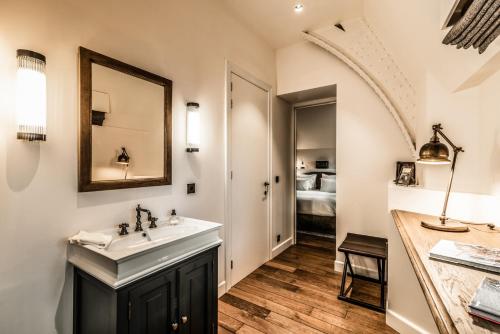 Imagen de la habitación del Hotel 1898 The Post. Foto 10