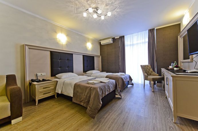 Imagen de la habitación del Hotel 19, Batumi. Foto 11