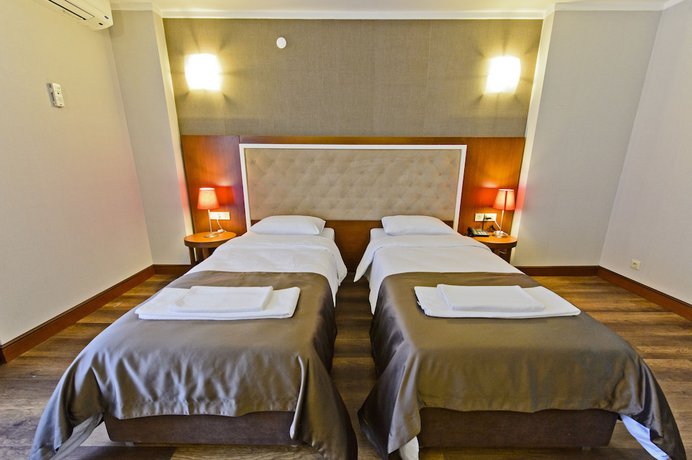Imagen de la habitación del Hotel 19, Batumi. Foto 13