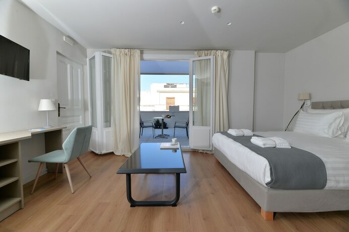 Imagen de la habitación del Hotel 1900 Athenian House. Foto 19