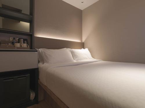 Imagen de la habitación del Hotel 1900 Chinatown. Foto 17